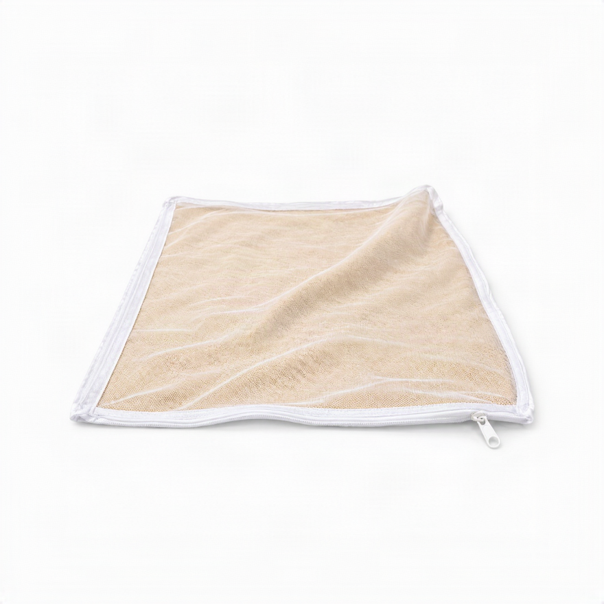 A square beige mesh bag with a white zipper and white trim, shown on a plain white background.